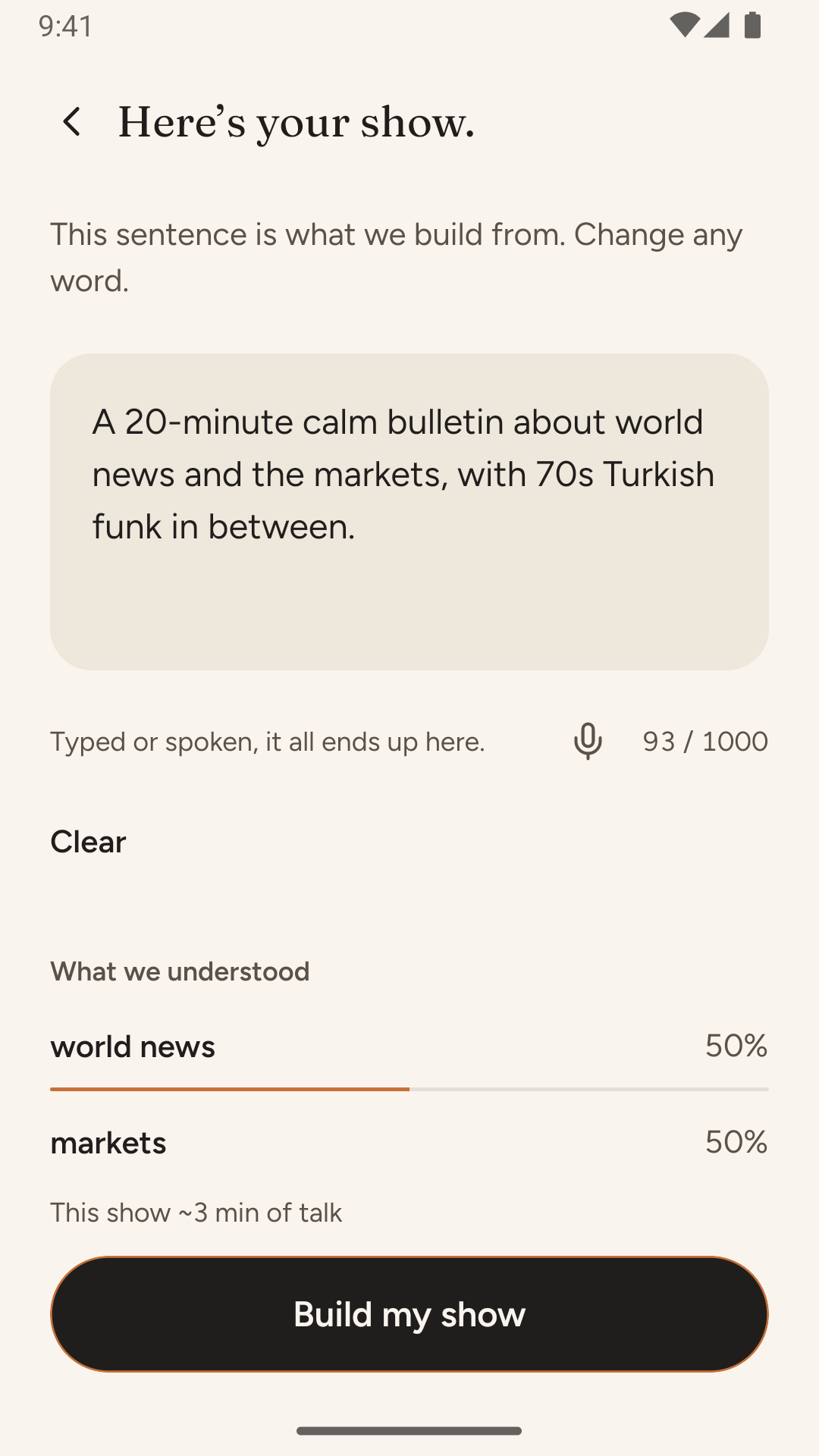 The review screen: the sentence as plain text, “What we understood” listing world news and markets at 50% each, and a Build my show button.